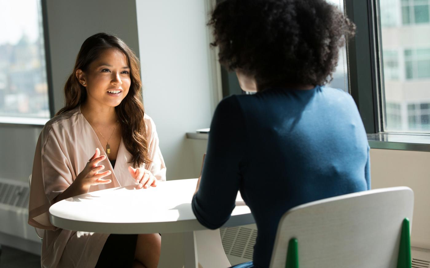 two women sitting on chair by Christina @ wocintechchat.com M courtesy of Unsplash.