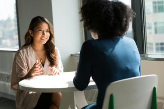 two women sitting on chair by Christina @ wocintechchat.com M courtesy of Unsplash.