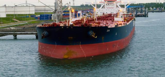 a large boat floating on top of a body of water by Georg Eiermann courtesy of Unsplash.